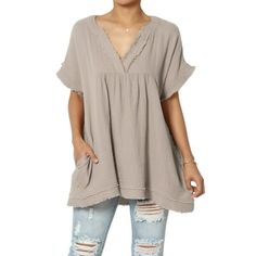 TheMogan Women's Casual Loose Short Sleeve V Neck Cotton Gauze Babydoll Shirt Blouse Top Tunic Step into summer with our Casual Loose Short Sleeve V-Neck Babydoll Blouse, a must-have for your cool, casual wardrobe. This top is crafted from 100% lightweight cotton gauze, featuring a relaxed babydoll silhouette with dolman sleeves and raw edge details for a touch of laid-back charm. The easy-care fabric makes it perfect for holiday wear or weekend outings. Pair with maternity jeans or leggings for Bohemian Short Sleeve Solid Top, Bohemian Style Solid Color Top With Short Sleeves, Cotton V-neck Solid Color Blouse, Bohemian Style Solid Short Sleeve Top, Cotton V-neck Blouse In Solid Color, Non-stretch Short Sleeve Blouse For Beach, Bohemian Short Sleeve Top, Non-stretch Cotton Beach Top, Bohemian Relaxed Fit Top