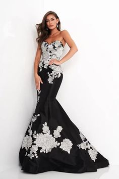 Elevate your evening look with the Jovani -3917 Floral Strapless Mermaid Evening Dress. This stunning dress features a gorgeous floral design and a flattering mermaid silhouette. Crafted with delicate detailing and expert craftsmanship, this dress is perfect for any special occasion. Embrace elegance and sophistication with Jovani. Mermaid Evening Gown, Hugging Silhouette, Long Train, Mermaid Evening Dresses, Mermaid Gown, Intricate Embroidery, Black Prom Dresses, Mermaid Dress, Fitted Silhouette