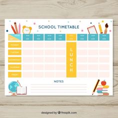 a school timetable is shown on a wooden table