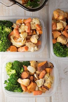 three plastic containers filled with different types of food