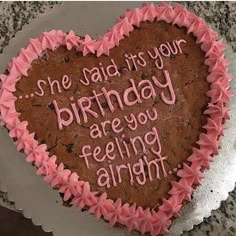 a heart shaped birthday cake with the words, she said it's your birthday are you feeling alright?