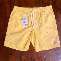 These New With Tags, Men’s Swim Shorts Are Nice Quality. They Have A Functional Drawstring, And The Yellow Is A Very Nice Color. Casual Yellow Cotton Bottoms, Yellow Cotton Shorts For Beach Season, Yellow Relaxed Fit Bottoms For Beach Season, Yellow Cotton Bottoms With Elastic Waistband, Casual Yellow Cotton Shorts, Yellow Short Swim Trunks For Beach, Yellow Cotton Beach Bottoms, Sporty Yellow Short Swim Trunks, Yellow Sports Swim Trunks