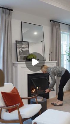 Kate Rumson on Instagram: "You’ve been asking about our fireplace, so here are all the details: it’s called @hearthcabinet , and it doesn’t require gas, electricity, or wood but uses alcohol gel fuel cartridges that produce real fire. It has the high-end look of a wood-burning fireplace but requires no ventilation and can be installed virtually anywhere. 

We chose this fireplace because we couldn’t build a chimney that would go all the way up to the roof because we have a window on the second floor above our fireplace, and we didn’t want to use a direct-vent fireplace because they’re extremely inefficient (energy efficiency was very important to us)

After nearly two years of use, we’re very happy with our choice. It looks just like a traditional wood-burning fireplace and is very easy to Fireplace With Chairs On Each Side, Electric Fireplace That Looks Real, Fireplace Painting Ideas, Wood Burning Fireplace Ideas, Propane Fireplace Indoor, Fireplace Insert Ideas, Kate Rumson, Gas Fireplace Ideas, Woodburning Fireplace