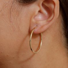 Solid 14k Yellow Gold Shiny Tube Hoop Earrings, Tube Hoop Earrings, Round Hoop Earrings, Gold Hoop Earrings, Hinged Clasp Hoop Earrings, 35 Mm Hoop Earrings. This 14k Solid Yellow Gold Tube Hoop Earrings Is Shiny And Gorgeous. Best Jewelry For Women, Girls To Attend Parties, Weddings Or Any Other Activities. .Crafted : 14k Solid Yellow Gold For A Life-Time Luster. Stamped 14k, High Polished Finish. Posts Ensure Are Securely And Comfortably In Place Throughout Your Daily Life. .Specifications & S Small Yellow Gold Hoop Earrings For Everyday Luxury, Yellow Gold Hoop Earrings With Ear Wire, 14k White Gold Hoop Earrings With Ear Wire, Fine Jewelry Small Hoop Earrings In Yellow Gold, Yellow Gold Round Hoop Earrings For Everyday, 14k Gold Hoop Earrings For Everyday Luxury, Classic Hoop Single Earring, 14k Gold Hoop Earrings With Ear Wire, Classic Single Hoop Earring