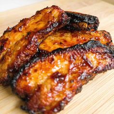 barbecued chicken wings on a white plate