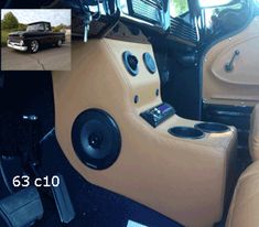 the inside of a vehicle with speakers and other items