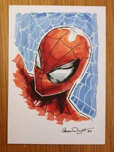 a drawing of a spider man on paper