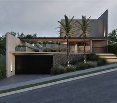 a modern house with palm trees in the front yard and stairs leading up to it