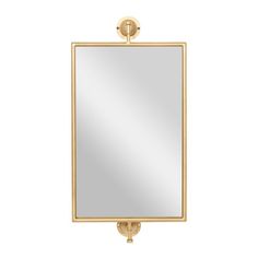 a gold framed mirror on a white background