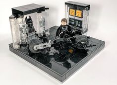 the lego batman movie set is displayed on a white surface with black and gray accents