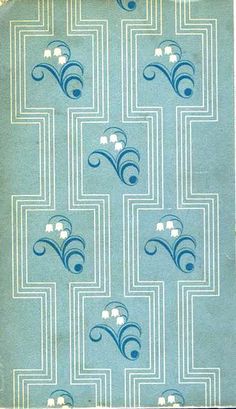 an old book with blue and white designs on it