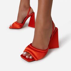 These Slingback Mules Put The F In Fabulous And Feature A Smooth Satin Fabric, Square Peep Toe Construction, Chunky, Sculpted Block Heel And Strap At Heel. Heel Height: 4.5”. True To Size On Most. Available In: Blue, Pink, Orange, Brown. Ego Shoes, Tie Heels, Block Heel Mule, Slingback Mules, African Dresses For Kids, Orange Satin, Floral Heels, Black Block Heels, Leather Heels Sandals