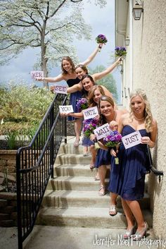 the bridesmaids are holding their bouquets and posing for pictures on the stairs