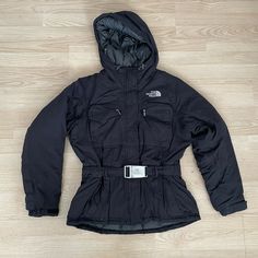 The North Face Womens Small Puffer Jacket Goose Down Hooded Belt. NOTE =small stain on the right sleeve see last picture!! The North Face Puffer Jacket With Detachable Hood, The North Face Streetwear Puffer Jacket With Detachable Hood, The North Face Hooded Jacket With Drawstring For Streetwear, The North Face Hooded Puffer Jacket With Detachable Hood, The North Face Winter Outerwear With Detachable Hood, The North Face Hooded Winter Outerwear, The North Face Hooded Winter Jacket For Streetwear, The North Face Hooded Jacket With Detachable Hood, The North Face Casual Outerwear With Detachable Hood