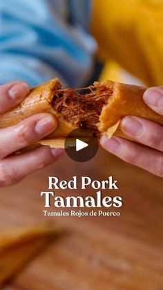 a person holding a piece of food in their hands with the words red pork tamales on it