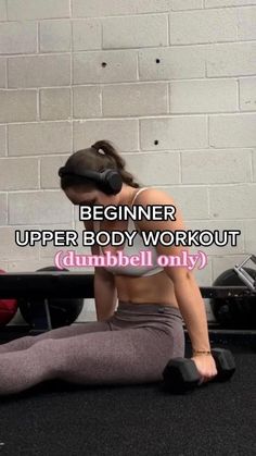 a woman sitting on the floor with headphones in her ears and text reading beginner upper body workout dumbbell only