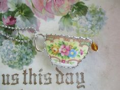 This Vintage Broken China was recycled into a teacup pendant from the most gorgeous Mildred Teacup.   The lip of the teacup has a drip of tea that dangles and the pendant includes a 30" ball chain necklace.   A custom made frame surrounds this vintage piece of china with my small signature scallops.  Measures 1 7/8" x 1". This is for the single pictured pendant only.  Picture props and multiple charms not included. Shipping is only $4.95 for first charm and free on any additional charms bought a Broken China Jewelry Diy, Squirrel Necklace, Romantic Tea, China Crafts, Angel Pendant Necklace, Picture Props, Backdrops Necklace, Broken China Jewelry, Picture Pendant