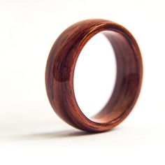 a wooden ring is shown against a white background