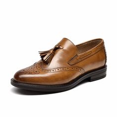 These loafers are crafted from premium calfskin to ensure comfort and durability. The classic brogue design is elevated by the trendy tassel detail, creating a unique and eye-catching shoe. Perfect for a day at the office or a night out with friends, these tassel brogue loafers will keep you looking stylish and feeling Brown Wingtip Loafers With Tassels, Business Tassel Loafers With Brogue Detailing And Round Toe, Office Wingtip Tassel Loafers With Brogue Detailing, Office Wingtip Loafers With Brogue Detailing, Business Wingtip Dress Shoes With Tassels, Formal Wingtip Oxfords With Tassels, Wingtip Leather Shoes With Tassels, Business Casual Tassel Loafers With Brogue Detailing, Wingtip Tassel Loafers With Brogue Detailing For Business