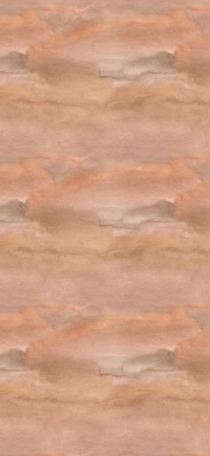 a brown and beige background with some light colored paint on it's surface,