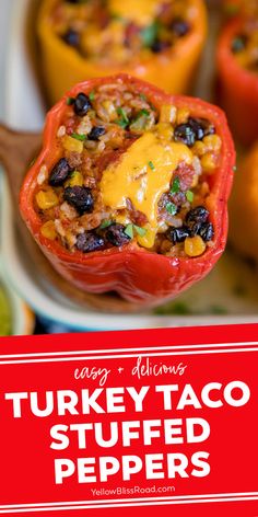 an image of stuffed peppers on a plate with text overlay that reads easy and delicious turkey taco stuffed peppers