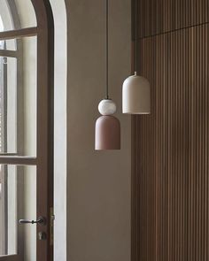 Bell copo pendant contemporary dome with marble sphere near entry door Minimalistic Lighting, Leaf Hunt, Bell Pendant Light, Marble Sphere, Green Silhouette, Brown Lamps, Orb Light, Contemporary Lighting Design, Decorative Stand