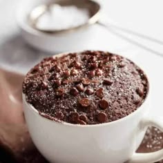 a close up of a cup of chocolate cake