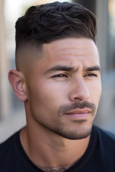 The swept-back waves with a low taper fade offer a relaxed yet fashionable appearance. This hairstyle involves styling hair in a swept-back manner accompanied by a gentle fade. Click here to check out more handsome low taper fade haircuts for men. Crew Cut Hair