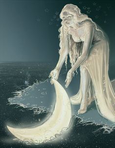 a woman sitting on top of a moon next to the ocean with her head down