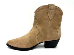 A modern cowgirl boot made to stay in style all year long. Match with jeans, skirts, dresses and shorts while experiencing lasting comfort with its padded insoles, spacious shaft openings and smooth suede uppers that form this vibrant olive bootie. Slip-on Block heel Pointed-toe Soft interior lining Cushioned leather footbed Composition: Upper: 100% Suede Outsole: 100% Rubber Footbed: 100% Leather Lining: 100% Leather Measurements: Heel Height: 2.5" Other colors: Olive New Collection Chili Beige Western Style Suede Boots For Spring, Casual Suede Boots For Ranch, Country Style Suede Boots With Round Toe, Casual Suede Boots For Rodeo, Beige Suede Boots, Short Western Boots, Modern Cowgirl, Cowgirl Boot, Beige Shorts