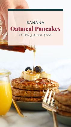 banana oatmeal pancakes are being drizzled with honey and syrup