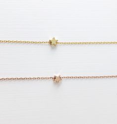 celestial jewelry, Dainty star necklace, Rose gold necklace, gold necklace, star jewelry, Layering necklace, Bridesmaid Gifts, best friend gifts, gifts for her D E T A I L S: *Shiny rose gold plated star or *matte gold plated star *Dainty cable chain, chose your perfect length *Lobster clasp closure SHIPPING: *Free domestic shipping on all orders over $35. PACKAGING: *All pieces come beautifully packaged, perfect for gift giving. Find more to ❤️ here: http://etsy.com/shop/thejewelrystandard Tiny Star Necklace, Jewelry Layering Necklace, Gifts Best Friend, Dainty Necklace Layered, Jewelry Layering, Star Necklace Gold, Necklace Star, Store Jewelry, Necklace Rose Gold