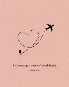 an airplane is flying in the sky with a heart