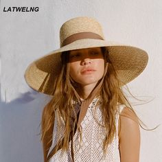 SPECIFICATIONSstyle 9: luxury sun hatstyle 8: wide brim bucket hatstyle 7: hats for women luxury designer brandstyle 6: sunshade hatstyle 5: beach accessories for womenstyle 2: dropshippingstyle 11: summer accessorystyle 10: church hatsstyle 1: uv protection hat womenStyle: CasualPattern Type: SolidOrigin: Mainland ChinaMaterial: StrawItem Type: Sun HatsGender: WOMENFeature: Sun protectionDepartment Name: AdultCN: ZhejiangBrand Name: LatwelngApplicable Season: Spring and SummerApplicable Scene: BeachAdult Head Size: 57cm Raffia Sun Hat, Straw Boater Hat, Womens Beach Hat, Straw Boater, Straw Fedora Hat, Beach Hats, Tie For Women, Lack Of Color, Boho Hat