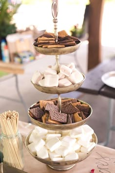 three tiered trays filled with marshmallows and crackers