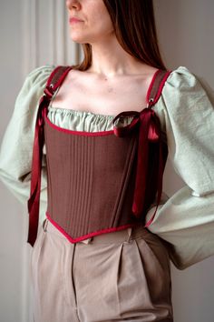 Reversible renaissance corset, linen overbust corset, brown & burgundy floral corset, Cosplay costume, princess stays, custom corset Transform your wardrobe with this stunning reversible corset ♡ Adorned in burgundy linen and classic brown linen on the other, this versatile piece offers double the style in one chic design. Featuring back lacing this corset ensures a perfect fit while adding an elegant touch to any ensemble.  ♡ Features♡ An accessory that evokes feelings of femininity, slendernes Vintage Brown Corset For Larp, Medieval Style Corset Belt With Fitted Bodice, Medieval Fitted Overbust Corset Belt, Fitted Medieval Overbust Corset Belt, Medieval Underbust Corset Belt, Brown Underbust Corset For Costume Party, Brown Underbust Corset Dress With Corset Back, Medieval Style Underbust Corset Belt With Boned Bodice, Medieval Overbust Fitted Corset Belt