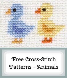 two cross - stitch ducks are standing next to each other