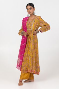 Mustard yellow A-line kurta with floral block print and sequin embroidered gathered yoke. Paired with matching embroidered hem pant. - Aza Fashions V-neck Chikankari Embroidery Sets For Diwali, Traditional Unstitched V-neck Sets, Diwali V-neck Sets With Chikankari Embroidery, Diwali V-neck Chikankari Embroidery Sets, Traditional V-neck Sets For Festivals, Traditional V-neck Diwali Sets, Semi-stitched V-neck Sets With Zari Work, Navratri V-neck Set With Chikankari Embroidery, Traditional V-neck Sets With Zari Work