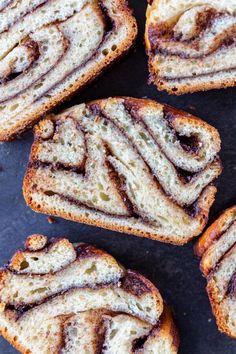 several pieces of bread with swirl designs on them