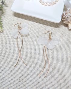 Floral Petals Dangle Earrings, Wedding Dainty Style Earrings, White Flower Bridal Earrings, Bridesmaid Flower Earrings

#bridalhair #bridalhairandjewelry #accessoriesforbrides #bridalbeauty #weddinghairinspo #bridebeauty #accessoriesforwedding #bridalfashion #brideaccessories #bridalhairaccessories #bridaljewelry #bridalstyle #bridalaccessories #jewelryforbrides Pearl Bridesmaid Jewelry, Beach Jewelry Boho, White Flower Earring, Flower Earrings Gold, Bridal Jewelry Necklace, Petal Earrings, Dainty Style, Bridesmaid Flower, Flower Dangle Earrings