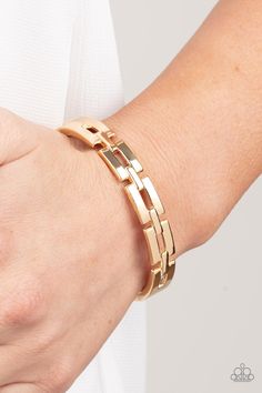 A glistening row of rectangular gold links boldly interlock across the top of the wrist, coalescing into an edgy bangle-like bracelet. Features a hinged closure.   Sold as one individual bracelet. Bling Empire, Paparazzi Consultant, Hinged Bracelet, Paparazzi Accessories, Affordable Jewelry, Live Show, Hinges, Circuit, Gold Jewelry