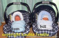 two baby strollers that have been placed side by side with their names on them