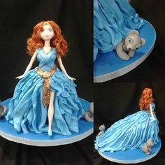 there is a cake made to look like a princess with red hair and blue dress