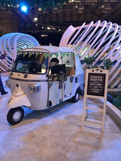 an electric vehicle is on display at the convention