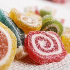 colorful candy candies on a white cloth