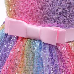 Your pretty little princess is sure to love this sleeveless Rainbow Sequins Princess Dress with its fluffy tulle tutu pink skirt and bow. Ideal for unicorn party rides and sparkly rainbow tea parties. Rainbow Sequins Princess Dress Details: Style: Sleeveless Tutu Dress Silhouette: Ball Gown Age Range: 9 months - 10 years old Gender: Girls Materials: Cotton, Polyester, Tulle Dress Length: Mid-calf Sleeve Length: Sleeveless Decoration: Sequined Tulle Dress w/ Bow Collar: O-Neck Fit: Fits true to s Spring Princess Tutu Dress With Bow, Spring Princess Style Tutu Dress With Bow, Princess Style Tutu Dress With Bow For Party, Playful Sleeveless Princess Dress For Party, Easter Multicolor Tutu Dress, Cute Multicolor Princess Dress For Party, Cute Multicolor Princess Dress For Easter, Playful Sequin Party Dresses, Playful Sequined Party Dress