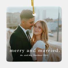 a christmas ornament that says merry and married with a photo of the couple