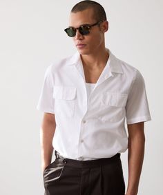 This 50s-inspired shirt is crafted from an exceptionally lightweight cotton poplin — breathable, cool, and not prone to wrinkling. It has a fine, silky feel that falls somewhere between our Summerweight and Oxford Shirts. Two patch-and-flap pockets at the chest give this short-sleeved shirt a more tailored look, which Sweatshorts Shorts, Polo Coat, Tuxedo Shirt Dress, Oxford Shirts, Todd Snyder, Linen Suits, Sneaker Dress Shoes, Casual Tank Tops, Oxford Shirt