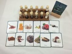 a set of seven cards with pictures of different foods and spices on them next to a book