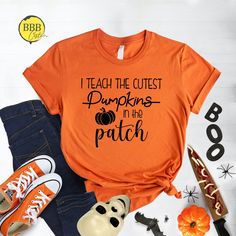 I Teach The Cutest Shirt, Thanks Shirt, Turkey Shirt, Thanksgiving Shirt, Pumpkin Shirt, Fall Shirt, Grateful Shirt, Thankful Family Shirt NOTE  We will use Black design for White, Athletic Heather and Heather Peach. White design for all other colors. Dear Customer, We're here to give you best Halloween shirt options for you. We want to make everyone smile with our cute , stylish and trendy graphic T-shirts. We can assure you this shirt will be perfect Halloween gift whether you will buy it yourself or for someone else. Check size chart before you purchase 2. How to Order * Pick your shirt type and size Your design will be printed on the front.  *Pick your t-shirt color 3.Production  Processing time is 1-3 business days. For rush orders please contact us first.  4.Shipping Domestic Shippin Grateful Shirt, Thankful Shirt, Turkey Shirts, Patches Shirt, Thanksgiving Shirt, Orange Design, Pumpkin Shirt, Funny Thanksgiving, Thanksgiving Shirts